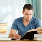 Depositphotos 11201823 stock photo student preparing for exam 150x150